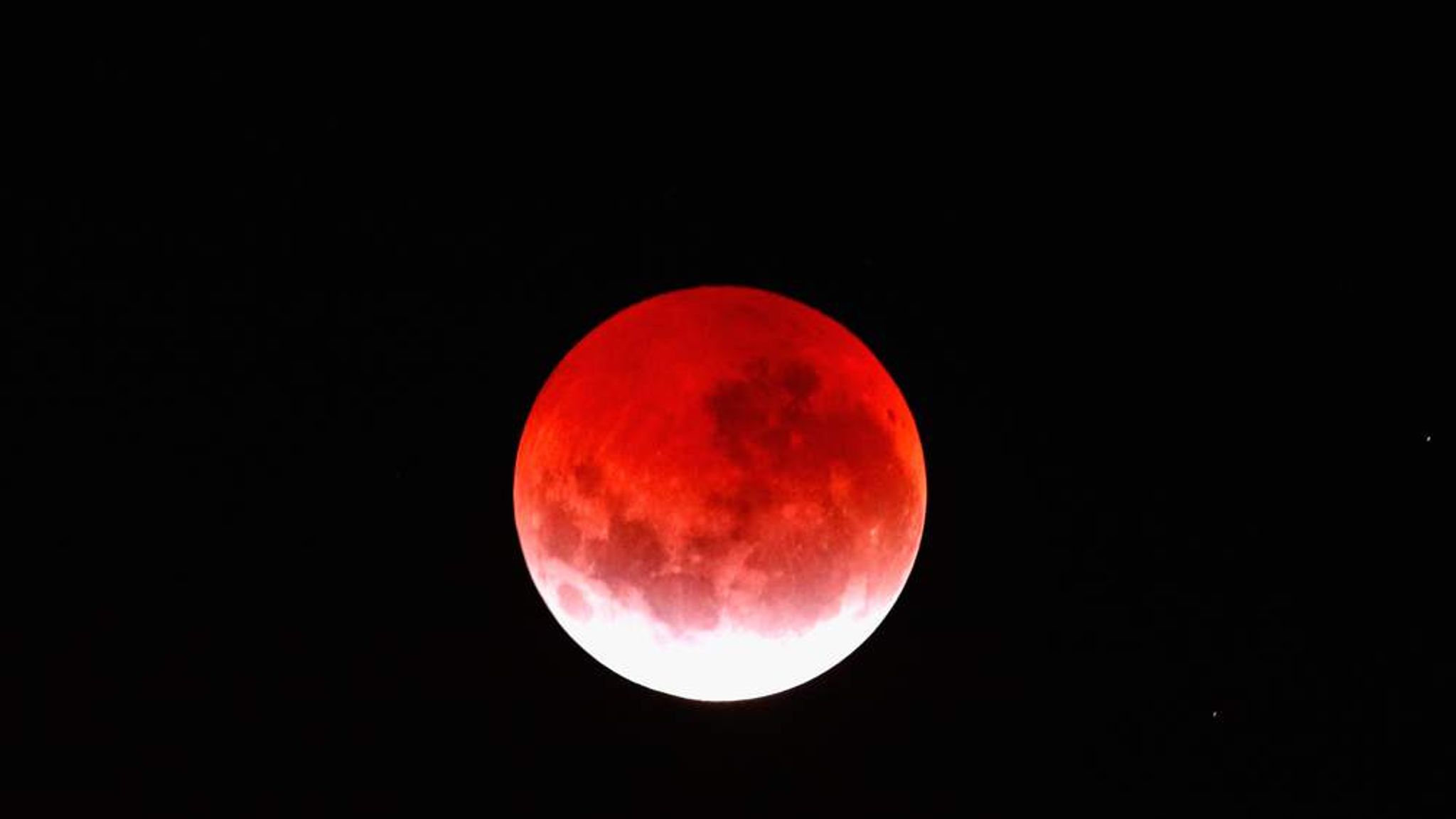 Total Lunar Eclipse Bathes Moon In Red Glow In North Europe