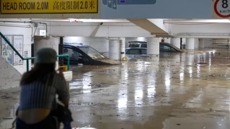 Hong Kong and Chinese Cities Battle Flooding From Record Rains